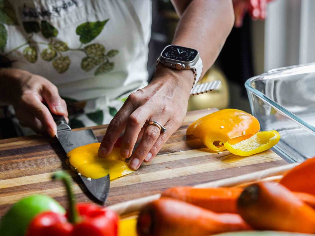 slicing yellow bell pepper